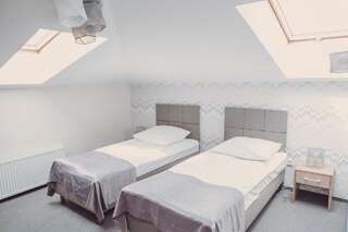 Проживание в семье Pokoje Goscinne Duet Члухув Двухместный номер с 2 отдельными кроватями и собственной ванной комнатой-15